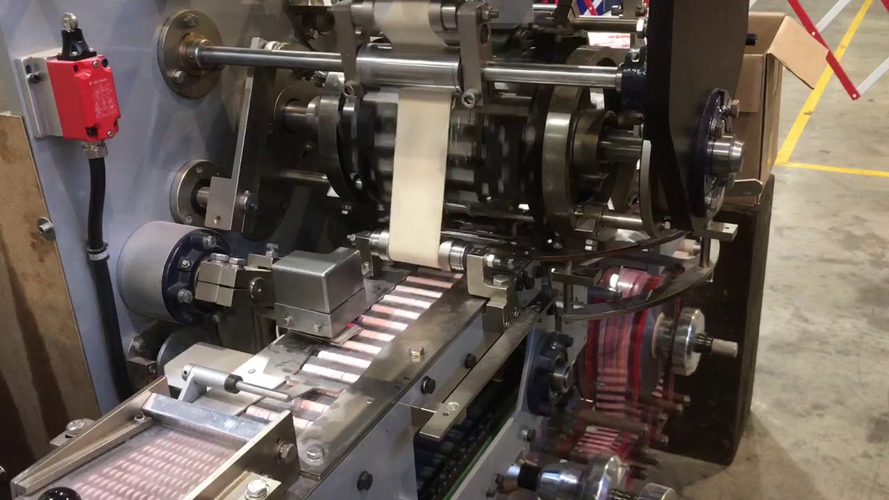 NEWK high speed tablet roll wrapping machine