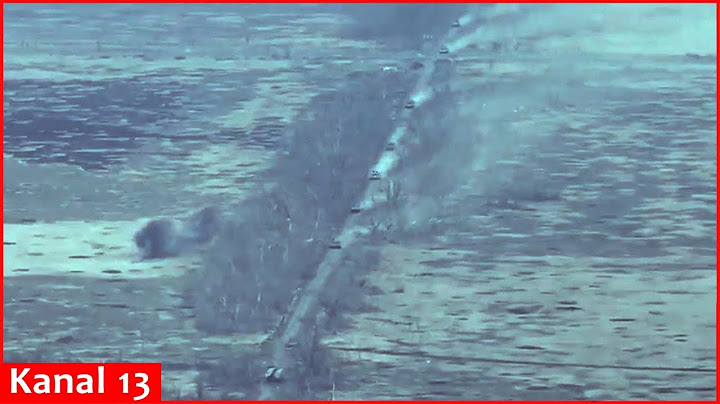 A large convoy of Russian armored vehicles attacking in the direction of Donetsk is fired upon