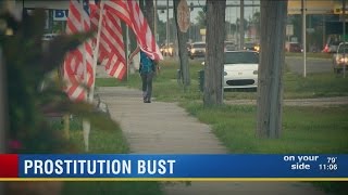 Store owners say they're glad to see prostitution bust