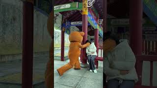 "A Bear's Warm Hug: Unforgettable Moments in the Park