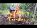 How I use a Kubota BX25D Tractor (small tractor) with a Backhoe to Remove Stumps