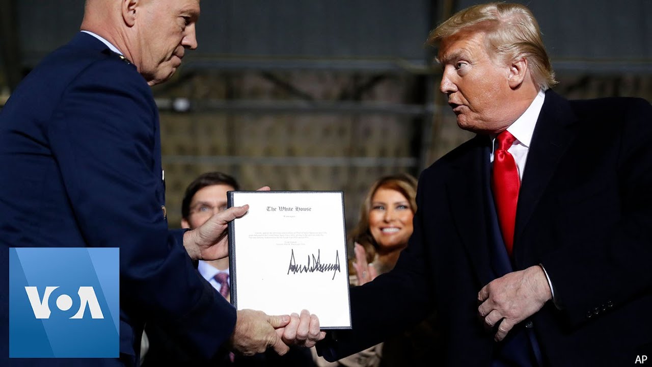 Trump signs defense bill, creating Space Force