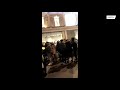 UK: Hundreds of customers queue without masks outside Harrods department store