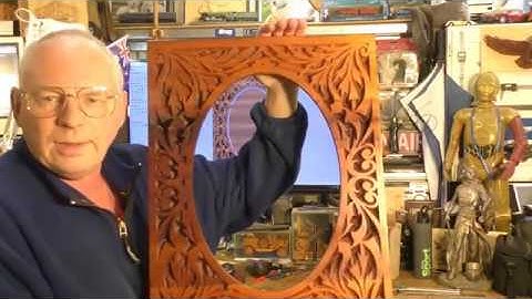 CNC router making $2,000 per day V bit carving a picture frames