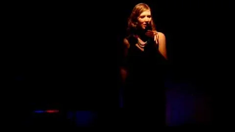 Amy Frey singing "World Goes Round"