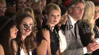 Taryn manning, Dascha Polanco, and guests observe the run...