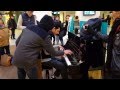 Amazing improvisation piano players at train station in paris