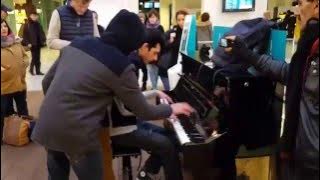 Amazing improvisation piano players at train station in Paris