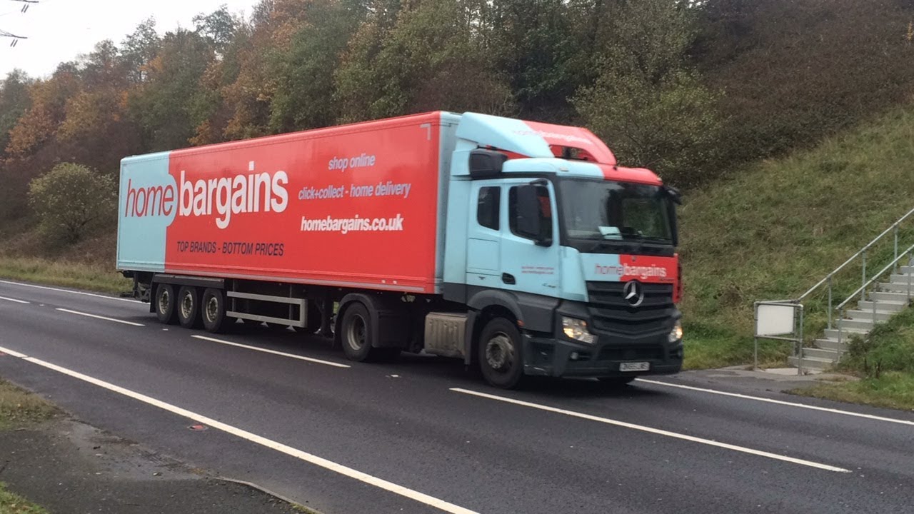 Home Bargains truck DX65 LWS heads along Stocksbridge Bypass towards