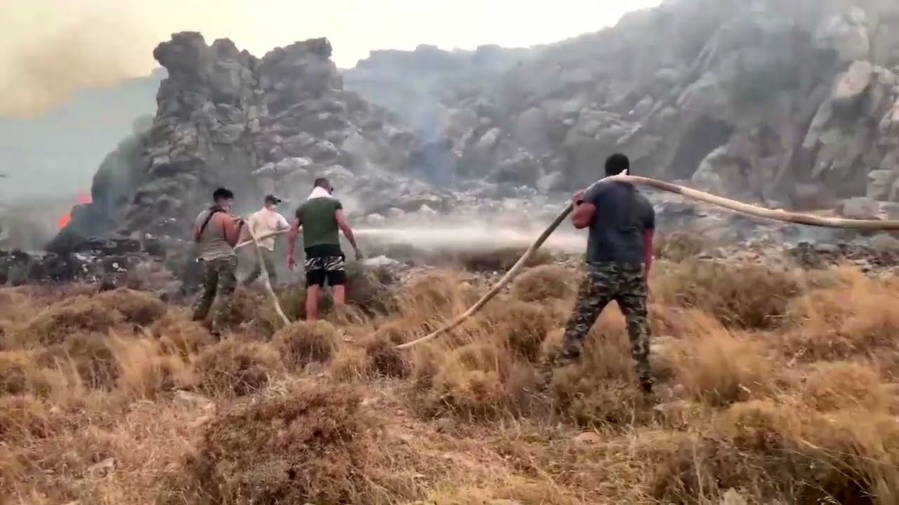 Wildfire on Greece's Rhodes forces mass evacuations