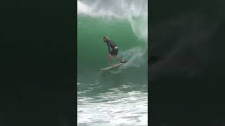 Surfer Takes On Crowded Local Break