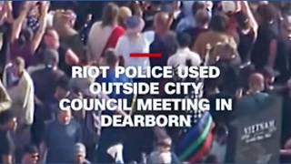Riot police used outside city council meeting in Michigan