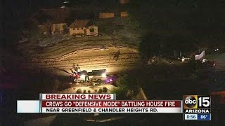 Crews go "defensive" battling house fire in Gilbert