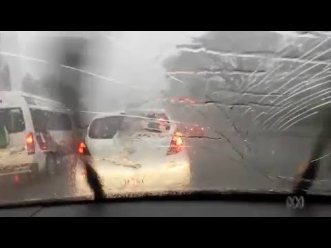 Windscreen smashes as hail pounds Brisbane - YouTube