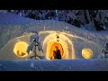 Surviving a blizzard in a giant snow cave dugout  cozy snow storm survival shelter solo camping