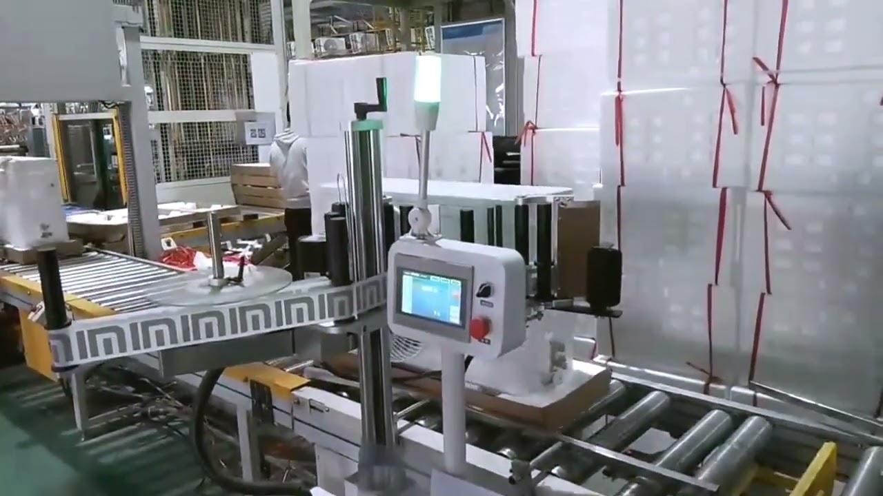 Air conditioner packing line integrated with side sticker labeller equipment