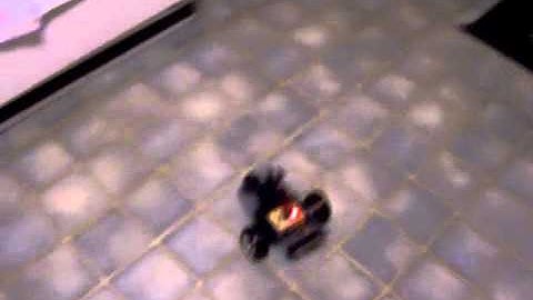 Atmel ATMega168 Differential Drive Robot Basic Obstacle Avoidance with Sharp IR Sensor