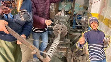 Mastering the Art of Manual Spring Crafting: A Skilled Team