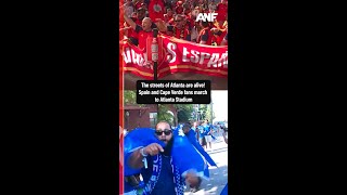 The streets of Atlanta are alive! Spain and Cape Verde fans march to Atlanta Stadium