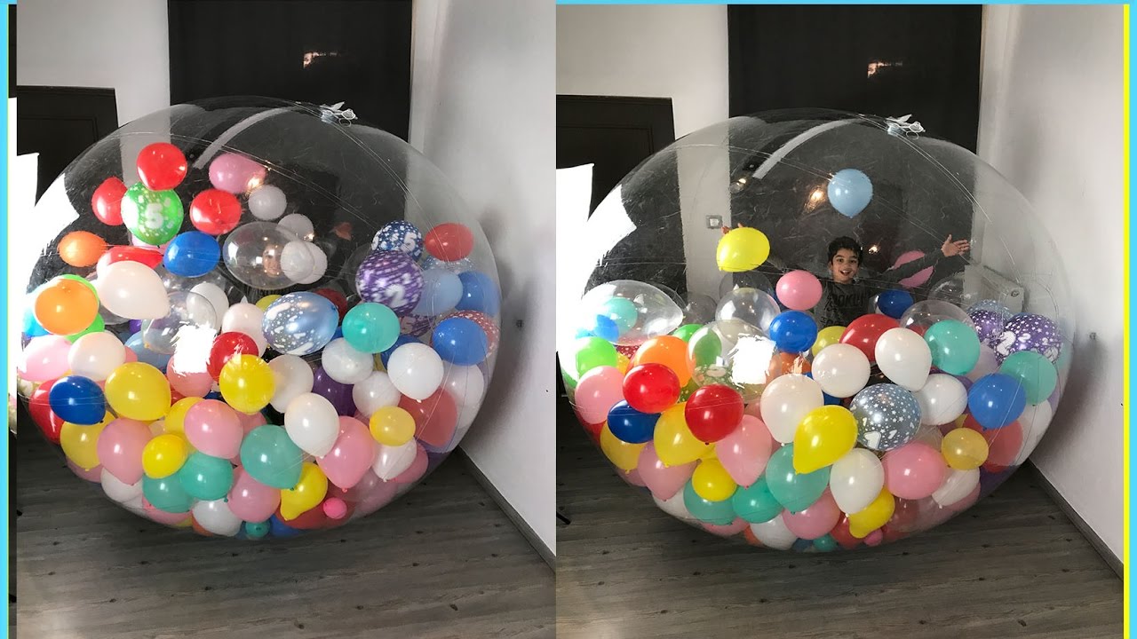A L'INTÉRIEUR D'UNE GEANTE BALLE EN BULLE REMPLIE DE BALLONS ! - BUBBLE BALL - StudioSurpriseToys