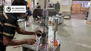Semi automatic Vial Cap Sealing Machine.