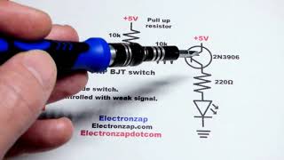 PNP BJT switch circuit basics using 2N3906 bipolar junction transistor with pull up resistor
