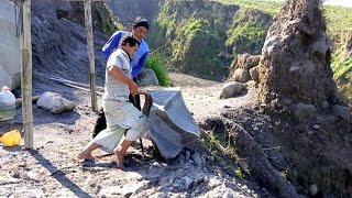 LARGE ROCKS AT THE TOP OF THE CLIFF HAVE STARTED TO BE SPLIT AND THROWN INTO THE RAVINE