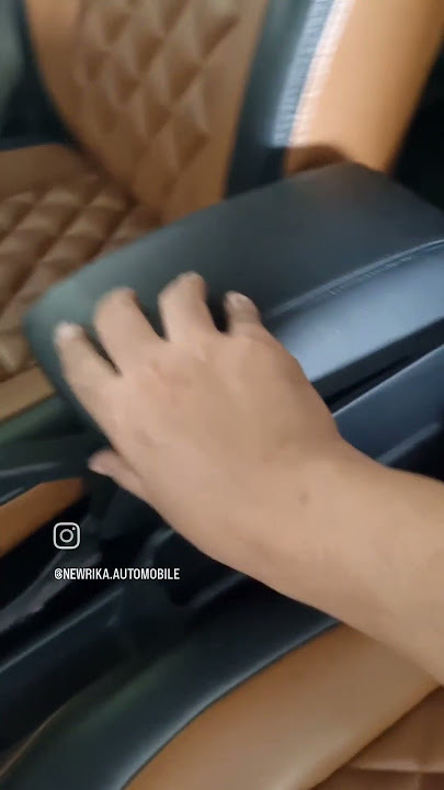 Daihatsu Luxio. Console box with armrest and charger. Newrika Automobile Jombang.