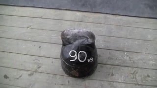 90 kg kettlebell jerk 10 reps with one hand (front view, side view)