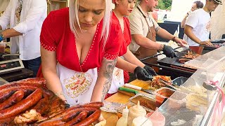 Street Food In Bucharest Romania Girls Prepare Sandwiches Stuffed With Sausage And Meat