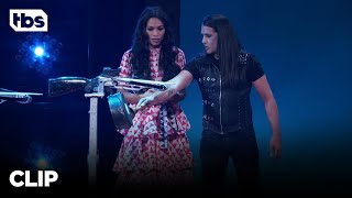 Go Big Show: Rosario Dawson Assists A Crossbow Performer (Clip) | TBS