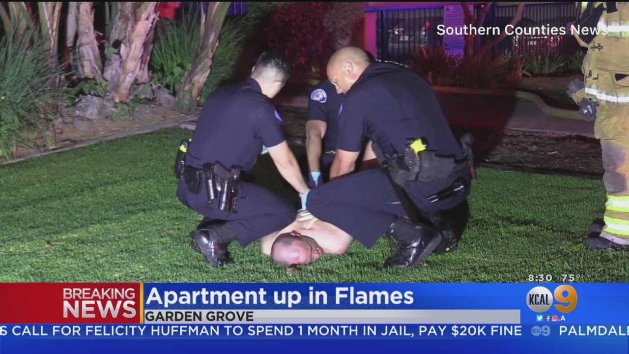 Naked Man Handcuffed By Police At Garden Grove Apartment Fire