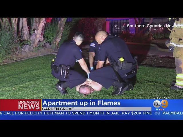 Naked Man Handcuffed By Police At Garden Grove Apartment Fire