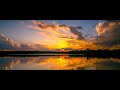 Time-lapse of clouds crashing into the sunset 2.4:1 (7680x3200) 21:9 8K HDR AV1