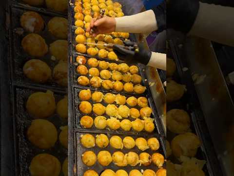 خبير تاكوياكي الكوري طعام الشارع الكوري 