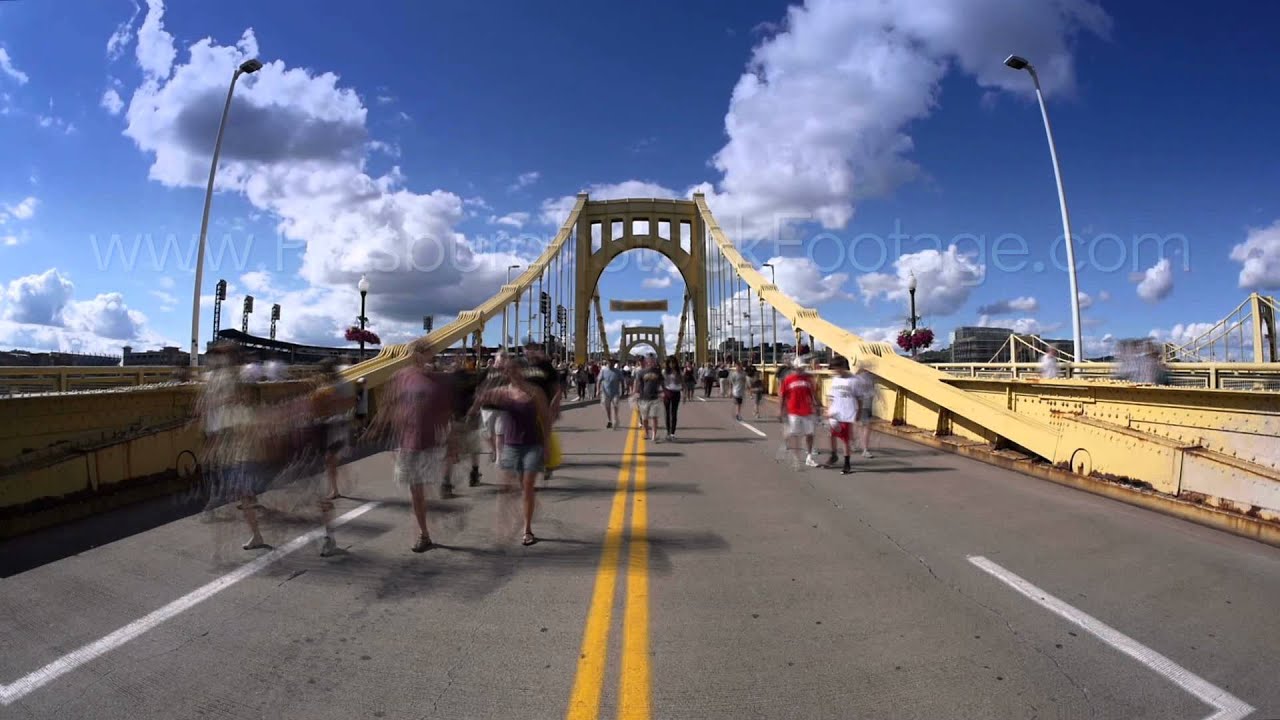Time Lapse of People Walking Across the Roberto Clemente Bridge