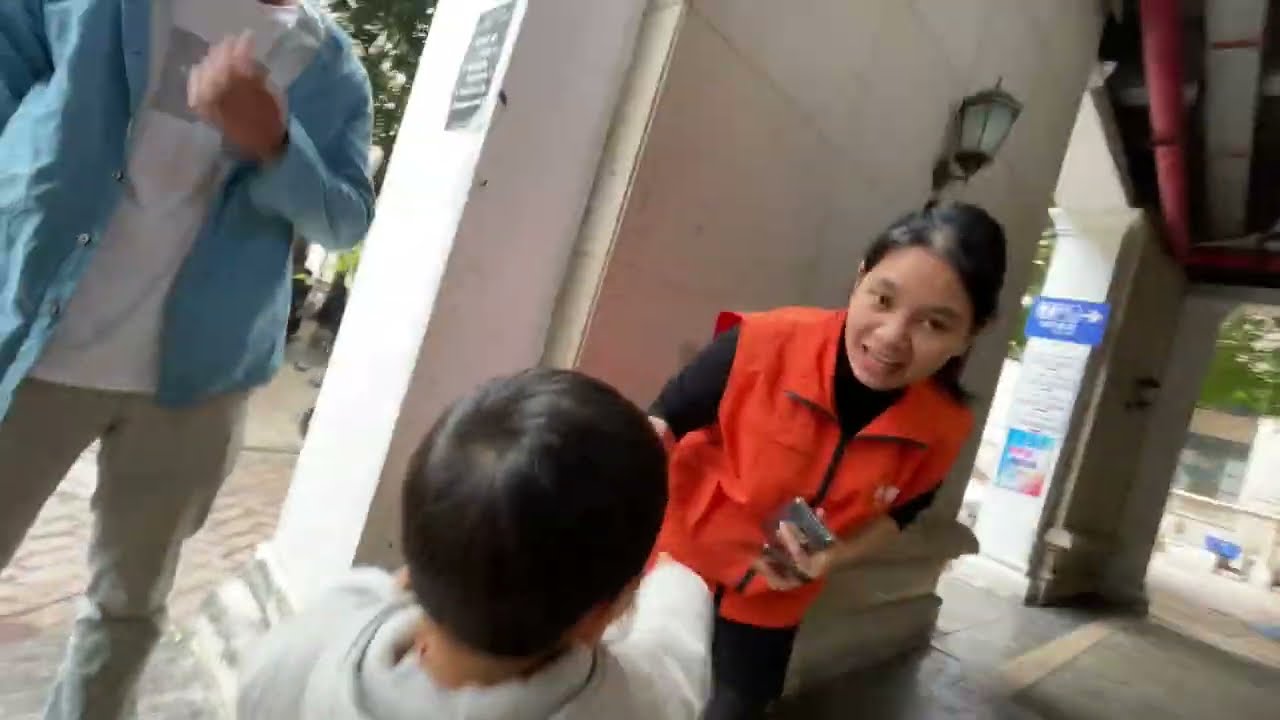 3 years old Chinese Krishna devotee distributing prasadam in China.