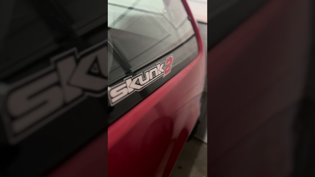 Putting in new skunk2 front lower control arms with spherical bushings!! 