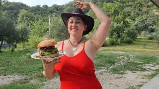 Big Burger On Fire Cooking In A Mountain Village Mila Cooking On An Open Fire Mila Naturist