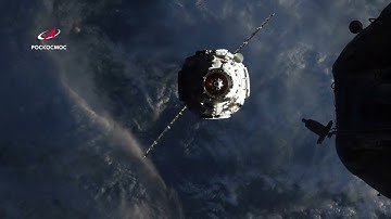 Стыковка, открытие люков и первый вид модуля «Причал» на орбите: 4К-видео
