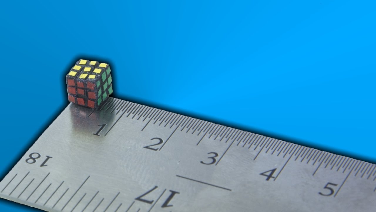 This mini Rubik's cube is almost exactly 1/4 the size of the real one. :  r/mildlyinteresting