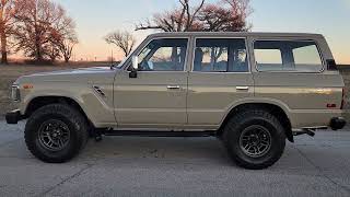 "Ultimate Restoration: Transforming a Tan FJ62 Toyota Land Cruiser into a Masterpiece"