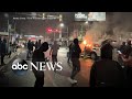Chaos erupts with demonstrators in Philadelphia after armed man shot by police