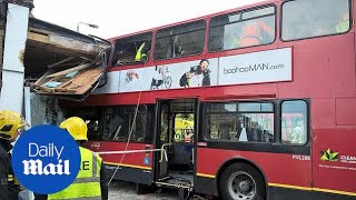 Double-decker bus crash in London leaves two trapped - Daily Mail