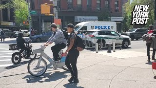 NYC professor who threatened to ‘chop’ Post reporter with machete is spotted at NYPD protest