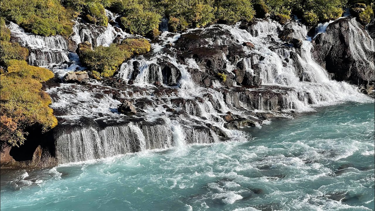 Milky blue waterfalls Hraunfossar and Barnafoss Vesturland Iceland — Hraunfossar and Barnafoss — video poster