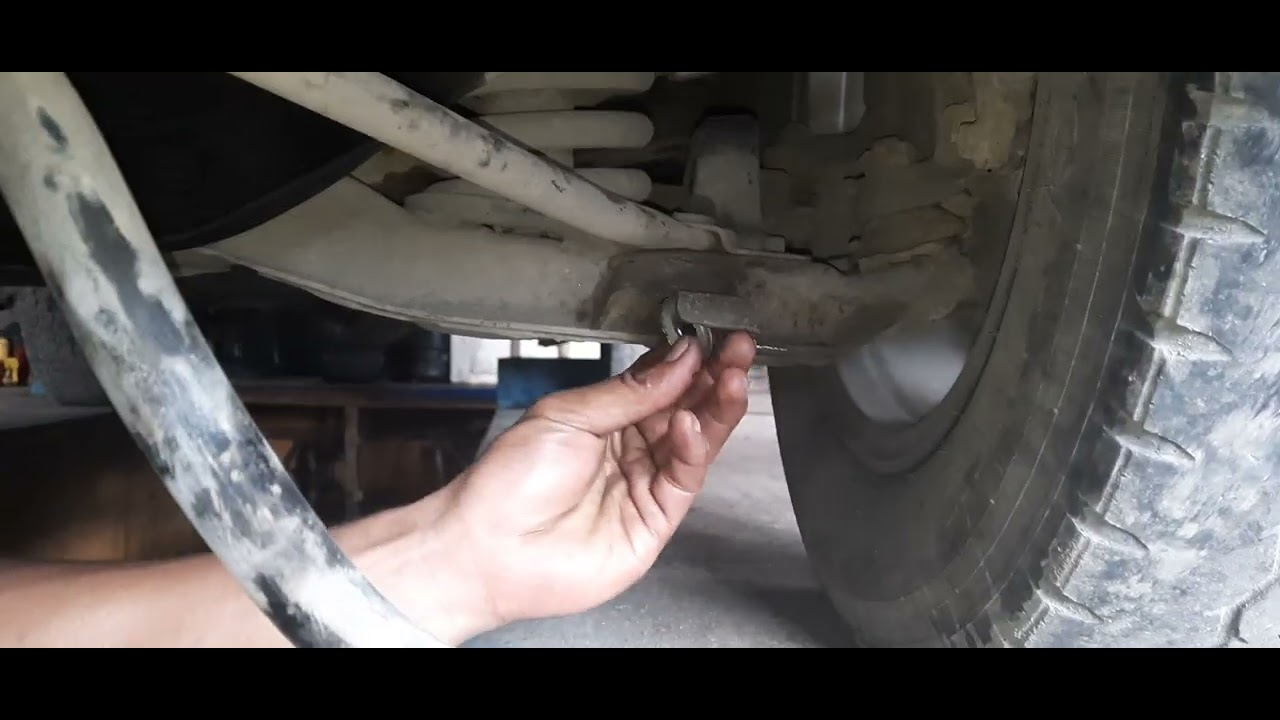 TORSION BAR BUSHING REPLACEMENT CAUSE OF CLANGKING SOUND MITSUBISHI