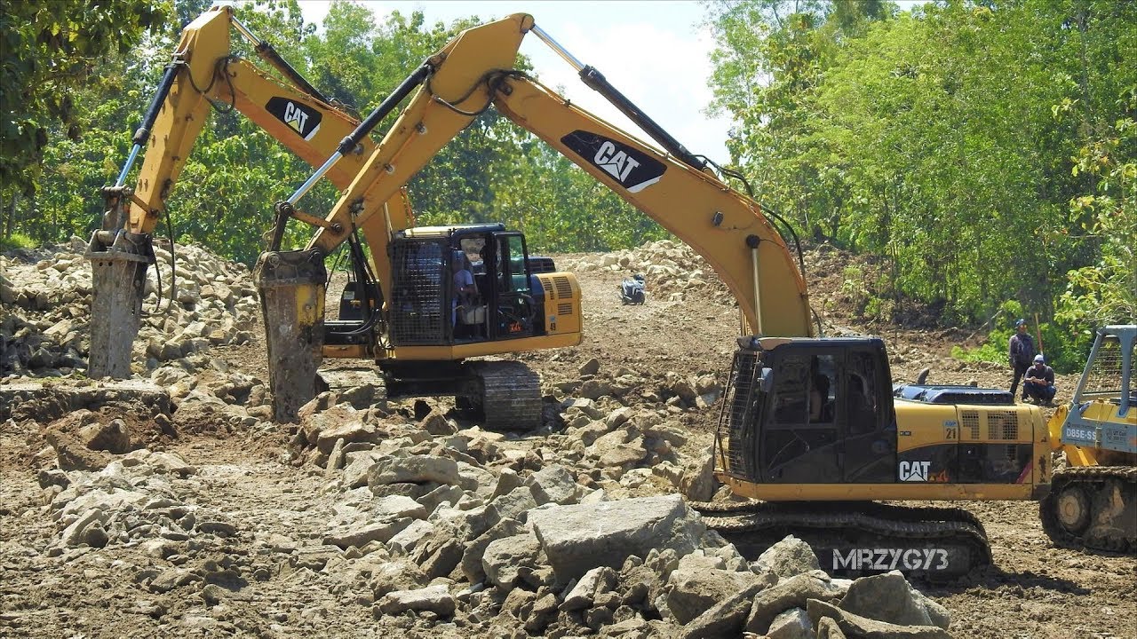 Excavator And Dozer Working On Road Construction CAT 320D Komatsu D85E ...