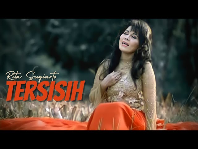 Rita Sugiarto - Tersisih (Official Music Video) class=