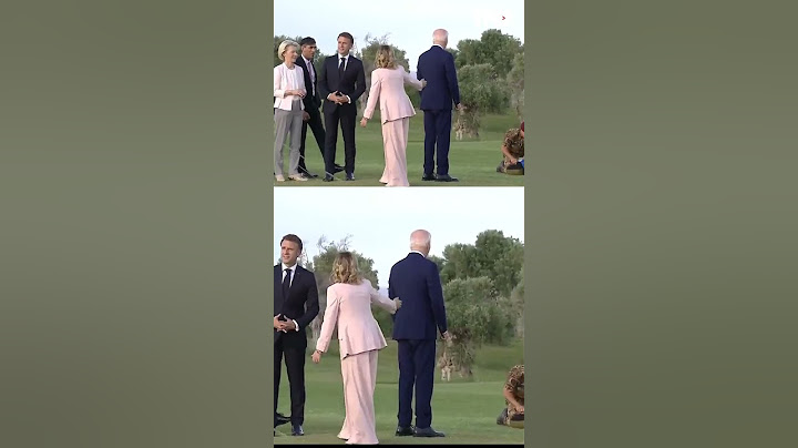 Biden appears to wander while other G7 leaders pose for photo